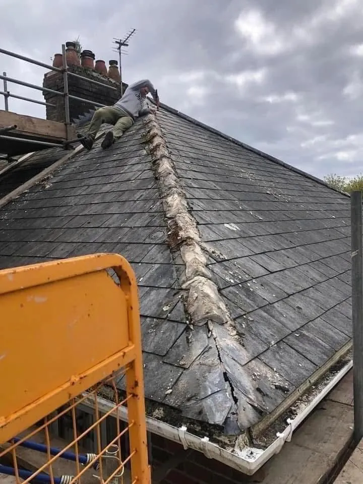 Slate roof ridge and chimney repair in Mevagissey